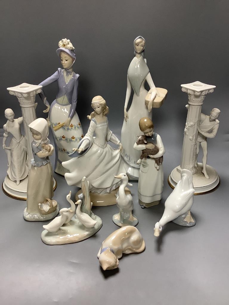 A quantity of Lladro, Nao and similar style figures